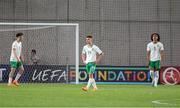 27 May 2023; Republic of Ireland players, from left, Freddie Turley, Matthew Moore and Jake Grante react during the UEFA European U17 Championship Quarter-Final match between Spain and Republic of Ireland at Hidegkuti Hándor Stadium in Budapest, Hungary. Photo by Laszlo Szirtesi/Sportsfile