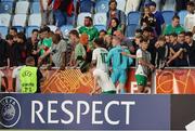 27 May 2023; Republic of Ireland players meet their families and friends after the UEFA European U17 Championship Quarter-Final match between Spain and Republic of Ireland at Hidegkuti Hándor Stadium in Budapest, Hungary. Photo by Laszlo Szirtesi/Sportsfile