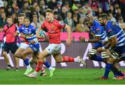 27 May 2023; Jack Crowley of Munster makes a break during the United Rugby Championship Final match between DHL Stormers and Munster at DHL Stadium in Cape Town, South Africa. Photo by Grant Pitcher/Sportsfile