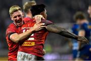 27 May 2023; Ben Healy, left, and Malakai Fekitoa of Munster celebrate at the final whistle of the United Rugby Championship Final match between DHL Stormers and Munster at DHL Stadium in Cape Town, South Africa. Photo by Ashley Vlotman/Sportsfile
