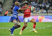 27 May 2023; Malakai Fekitoa of Munster is tackled by Hacjivah Dayimani of DHL Stormers during the United Rugby Championship Final match between DHL Stormers and Munster at DHL Stadium in Cape Town, South Africa. Photo by Grant Pitcher/Sportsfile