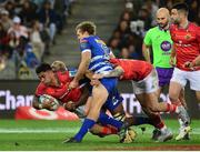 27 May 2023; Malakai Fekitoa of Munster is tackled by Dan du Plessis and Hacjivah Dayimani of DHL Stormers during the United Rugby Championship Final match between DHL Stormers and Munster at DHL Stadium in Cape Town, South Africa. Photo by Grant Pitcher/Sportsfile
