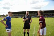 27 May 2023; Referee Matthew Farrell performs the coin toss during the GAA Celtic Challenge Cup Finals match between Galway and Tipperary at St Brendan’s Park in Birr, Offaly. Photo by Michael P Ryan/Sportsfile *** NO REPRODUCTION FEE***