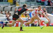27 May 2023; Brian Hurley of Cork in action against Dermot Campbell of Louth during the GAA Football All-Ireland Senior Championship Round 1 match between Louth and Cork at Páirc Tailteann in Navan, Meath. Photo by Seb Daly/Sportsfile
