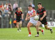 27 May 2023; Craig Lennon of Louth in action against Sean Powter of Cork during the GAA Football All-Ireland Senior Championship Round 1 match between Louth and Cork at Páirc Tailteann in Navan, Meath. Photo by Seb Daly/Sportsfile