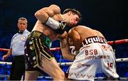 27 May 2023; Michael Conlan, left, in action against Luis Alberto Lopez during their IBF Featherweight World Title bout during their IBF Featherweight World Title bout at the SSE Arena in Belfast. Photo by Ramsey Cardy/Sportsfile