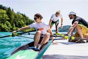 28 May 2023; Zoe Hyde, left, and Sanita Puspure of Ireland with Ireland team coach Giuseppe de Vita prior to the competition in the Women's Double Sculls Final A during day 4 of the European Rowing Championships 2023 at Bled in Slovenia. Photo by Vid Ponikvar/Sportsfile