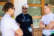 28 May 2023; Team coach of Ireland Giuseppe de Vita talks to Zoe Hyde, left, and Sanita Puspure of Ireland during day 4 of the European Rowing Championships 2023 at Bled in Slovenia. Photo by Vid Ponikvar/Sportsfile