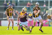 28 May 2023; Ian Carty of Wexford in action against TJ Reid of Kilkenny during the Leinster GAA Hurling Senior Championship Round 5 match between Wexford and Kilkenny at Chadwicks Wexford Park in Wexford. Photo by Eóin Noonan/Sportsfile