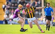 28 May 2023; Adrian Mullen of Kilkenny is tackled by Simon Donohoe of Wexford during the Leinster GAA Hurling Senior Championship Round 5 match between Wexford and Kilkenny at Chadwicks Wexford Park in Wexford. Photo by Eóin Noonan/Sportsfile