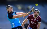 28 May 2023; Donal Burke of Dublin scores a point despite pressure from Padraic Mannion of Galway during the Leinster GAA Hurling Senior Championship Round 5 match between Dublin and Galway at Croke Park in Dublin. Photo by Ramsey Cardy/Sportsfile