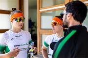 28 May 2023; Imogen Magner, left, and Natalie Long of Ireland talk to coach Giuseppe de Vita prior to the competition in the Women's Pair Final B during day 4 of the European Rowing Championships 2023 at Bled in Slovenia. Photo by Vid Ponikvar/Sportsfile
