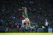 28 May 2023; Gearoid Hegarty of Limerick in action against Robert Downey of Cork during the Munster GAA Hurling Senior Championship Round 5 match between Limerick and Cork at TUS Gaelic Grounds in Limerick. Photo by Daire Brennan/Sportsfile