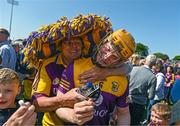 28 May 2023; Simon Donohoe of Wexford celebrates with supporter Myle Connors after the Leinster GAA Hurling Senior Championship Round 5 match between Wexford and Kilkenny at Chadwicks Wexford Park in Wexford. Photo by Eóin Noonan/Sportsfile
