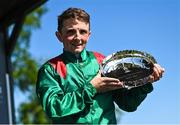 28 May 2023; Chris Hayes celebrates with the plate after winning the Tattersalls Irish 1,000 Guineas on Tahiyra during the Tattersalls Irish Guineas Festival at The Curragh Racecourse in Kildare. Photo by David Fitzgerald/Sportsfile