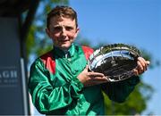 28 May 2023; Chris Hayes celebrates with the plate after winning the Tattersalls Irish 1,000 Guineas on Tahiyra during the Tattersalls Irish Guineas Festival at The Curragh Racecourse in Kildare. Photo by David Fitzgerald/Sportsfile