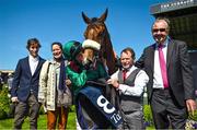 28 May 2023; Jockey Chris Hayes kisses Tahiyra alongside winning connections after winning the Tattersalls Irish 1,000 Guineas during the Tattersalls Irish Guineas Festival at The Curragh Racecourse in Kildare. Photo by David Fitzgerald/Sportsfile