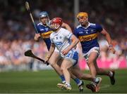 28 May 2023; Patrick Fitzgerald of Waterford in action against Tipperary players Conor Bowe, left,  and  Ronan Maher during the Munster GAA Hurling Senior Championship Round 5 match between Tipperary and Waterford at FBD Semple Stadium in Thurles, Tipperary. Photo by Michael P Ryan/Sportsfile