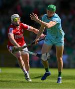 28 May 2023; Limerick goalkeeper Nickie Quaid is tackled by Patrick Horgan of Cork during the Munster GAA Hurling Senior Championship Round 5 match between Limerick and Cork at TUS Gaelic Grounds in Limerick. Photo by Ray McManus/Sportsfile