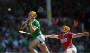 28 May 2023; Cathal O'Neill of Limerick scores his side's second goal despite the challenge from Niall O'Leary of Cork during the Munster GAA Hurling Senior Championship Round 5 match between Limerick and Cork at TUS Gaelic Grounds in Limerick. Photo by Daire Brennan/Sportsfile