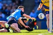 28 May 2023; John Small of Dublin scores his side's first goal despite the efforts of Roscommon goalkeeper Conor Carroll during the GAA Football All-Ireland Senior Championship Round 1 match between Dublin and Roscommon at Croke Park in Dublin. Photo by Ramsey Cardy/Sportsfile