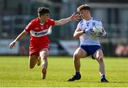 28 May 2023; Tommy Mallen of Monaghan in action against Johnny McGuckian of Derry during the Electric Ireland Ulster Minor GAA Football Championship Final match between Derry and Monaghan at Box-It Athletic Grounds in Armagh. Photo by Stephen Marken/Sportsfile