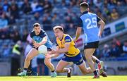 28 May 2023; Enda Smith of Roscommon in action against Colm Basquel, left, and Niall Scully of Dublin during the GAA Football All-Ireland Senior Championship Round 1 match between Dublin and Roscommon at Croke Park in Dublin. Photo by Ramsey Cardy/Sportsfile