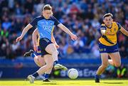 28 May 2023; Tom Lahiff of Dublin shoots at goal under pressure from Brian Stack of Roscommon during the GAA Football All-Ireland Senior Championship Round 1 match between Dublin and Roscommon at Croke Park in Dublin. Photo by Ramsey Cardy/Sportsfile