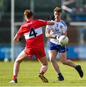 28 May 2023; Tommy Mallen of Monaghan in action against Luke Grant of Derry during the Electric Ireland Ulster Minor GAA Football Championship Final match between Derry and Monaghan at Box-It Athletic Grounds in Armagh. Photo by Stephen Marken/Sportsfile