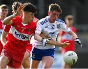 28 May 2023; Conor Meehan of Monaghan in action against Odhran Campbell of Derry during the Electric Ireland Ulster Minor GAA Football Championship Final match between Derry and Monaghan at Box-It Athletic Grounds in Armagh. Photo by Stephen Marken/Sportsfile