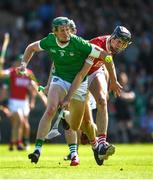 28 May 2023; William O'Donoghue of Limerick in action against Robert Downey of Cork during the Munster GAA Hurling Senior Championship Round 5 match between Limerick and Cork at TUS Gaelic Grounds in Limerick. Photo by Daire Brennan/Sportsfile