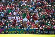 28 May 2023; Gearoid Hegarty of Limerick in action against Robert Downey of Cork during the Munster GAA Hurling Senior Championship Round 5 match between Limerick and Cork at TUS Gaelic Grounds in Limerick. Photo by Daire Brennan/Sportsfile
