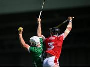 28 May 2023; Aaron Gillane of Limerick wins possession ahead of Damien Cahalane of Cork during the Munster GAA Hurling Senior Championship Round 5 match between Limerick and Cork at TUS Gaelic Grounds in Limerick. Photo by Ray McManus/Sportsfile