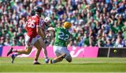 28 May 2023; Patrick Horgan of Cork scores his side's first goal despite the efforts of Richie English of Limerick during the Munster GAA Hurling Senior Championship Round 5 match between Limerick and Cork at TUS Gaelic Grounds in Limerick. Photo by John Sheridan/Sportsfile