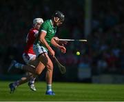 28 May 2023; Gearoid Hegarty of Limerick is tackled by Patrick Horgan of Cork during the Munster GAA Hurling Senior Championship Round 5 match between Limerick and Cork at TUS Gaelic Grounds in Limerick. Photo by Ray McManus/Sportsfile