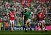28 May 2023; Kyle Hayes of Limerick races clear of Luke Meade of Cork during the Munster GAA Hurling Senior Championship Round 5 match between Limerick and Cork at TUS Gaelic Grounds in Limerick. Photo by Ray McManus/Sportsfile