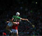 28 May 2023; Aaron Gillane  of Limerick is tackled by Sean O'Donoghue of Cork during the Munster GAA Hurling Senior Championship Round 5 match between Limerick and Cork at TUS Gaelic Grounds in Limerick. Photo by Ray McManus/Sportsfile