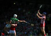 28 May 2023; Cork goalkeeper Patrick Collins prepares to stop the sliothar as Aaron Gillane  of Limerick is tackled by Sean O'Donoghue of Cork during the Munster GAA Hurling Senior Championship Round 5 match between Limerick and Cork at TUS Gaelic Grounds in Limerick. Photo by Ray McManus/Sportsfile