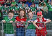 28 May 2023; Limerick and Cork cousins, Cian Brosnahan, aged eight, Aoife Barrett, aged nine, Orla Brosnahan, aged ten, and Eoin Barrett aged nine, before the Munster GAA Hurling Senior Championship Round 5 match between Limerick and Cork at TUS Gaelic Grounds in Limerick. Photo by Ray McManus/Sportsfile
