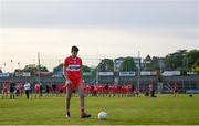 28 May 2023; Conall Higgns of Derry collects the ball before taking the winning penalty in the shootout to decide the Electric Ireland Ulster Minor GAA Football Championship Final match between Derry and Monaghan at Box-It Athletic Grounds in Armagh. Photo by Stephen Marken/Sportsfile