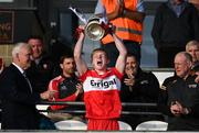 28 May 2023; Derry captain Fionn McEldowney lifts the cup after the Electric Ireland Ulster Minor GAA Football Championship Final match between Derry and Monaghan at Box-It Athletic Grounds in Armagh. Photo by Stephen Marken/Sportsfile