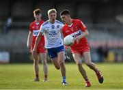 28 May 2023; Ger Dillon of Derry in action against Jamie McCaughey of Monaghan  during the Electric Ireland Ulster Minor GAA Football Championship Final match between Derry and Monaghan at Box-It Athletic Grounds in Armagh. Photo by Stephen Marken/Sportsfile