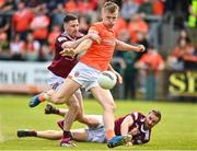 27 May 2023; Rian O'Neill of Armagh in action against James Dolan of Westmeath during the GAA Football All-Ireland Senior Championship Round 1 match between Armagh and Westmeath at the BOX-IT Athletic Grounds in Armagh. Photo by Oliver McVeigh/Sportsfile
