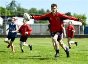 30 May 2023; James Matthews of St Kevin's National School during the Leinster Rugby kids blitz at Ardee RFC in Louth. Photo by Tyler Miller/Sportsfile