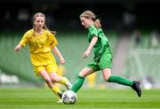 31 May 2023; Mairéad Mullins of Castleblakeney NS, Galway, in action during the ‘A’ Girls Cup, for small sized schools, during the FAI Primary School 5s National Finals at the Aviva Stadium in Dublin. Photo by Stephen McCarthy/Sportsfile