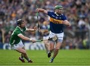 21 May 2023; Noel McGrath of Tipperary is tackled by Diarmaid Byrnes of Limerick during the Munster GAA Hurling Senior Championship Round 4 match between Tipperary and Limerick at FBD Semple Stadium in Thurles, Tipperary. Photo by Brendan Moran/Sportsfile
