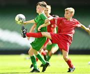 31 May 2023; Jack Nolan of St Mary’s NS, Mountbellew, Galway, in action against Calum Curtin of Scoil Naomh Iosef, Dromcollogher, Limerick, during the ‘A’ Cup, for mixed small sized schools, at the FAI Primary School 5s National Finals in the Aviva Stadium, Dublin. Photo by Eóin Noonan/Sportsfile