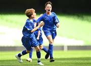 31 May 2023; Oisín Wall of St Joseph’s NS, Hacketstown, Carlow, celebrates with teammate Noel Butler, left, after scoring a goal during the ‘A’ Cup, for mixed small sized schools, at the FAI Primary School 5s National Finals in the Aviva Stadium, Dublin. Photo by Eóin Noonan/Sportsfile