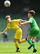 31 May 2023; Cadhan McGonagle of Scoil Naomh Colmcille, Donegal, in action against Ronan McDermott of St Mary’s NS, Mountbellew, Galway, during the ‘A’ Cup, for mixed small sized schools, at the FAI Primary School 5s National Finals in the Aviva Stadium, Dublin. Photo by Eóin Noonan/Sportsfile