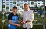 31 May 2023; Bill Boucher of Electric Ireland presents the Electric Ireland Player of the Match award to Lenny Cahill of Dublin following his performance in the 2023 Electric Ireland Leinster GAA Football Minor Championship Final match between Dublin and Kildare at Laois Hire O'Moore Park in Portlaoise, Laois. Photo by Piaras Ó Mídheach/Sportsfile